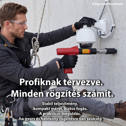 kézi szögbelövő pisztoly, piros, kültéri rögzítési munkánál használva