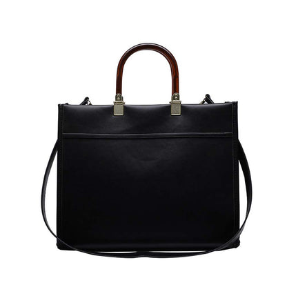 Dollcini fekete strukturált női crossbody kézitáska, felső fogantyúval és vállpánttal