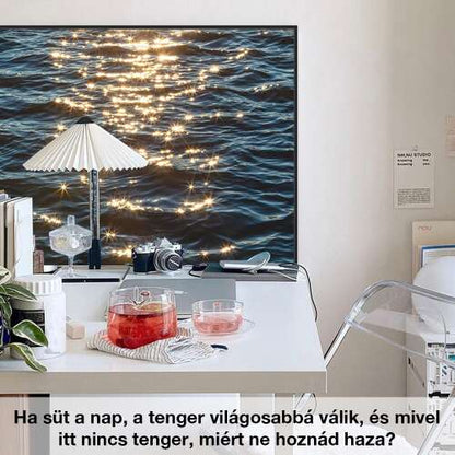 3D homokfestmény, tengeri napfény motívummal éjjeliszekrény fölött