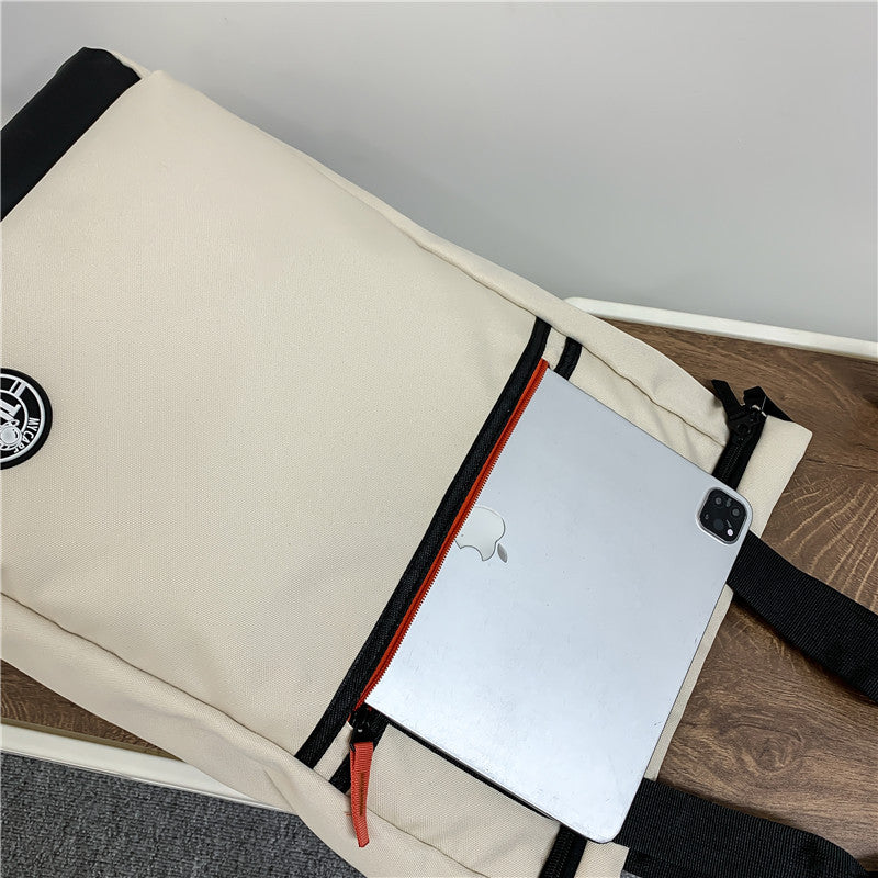 krémszínű uniszex laptop hátizsák külső zsebbel és behelyezett tablettel