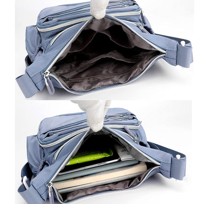 női oldaltáska, nylon anyagból, laptoprekesszel, belső rekeszekkel