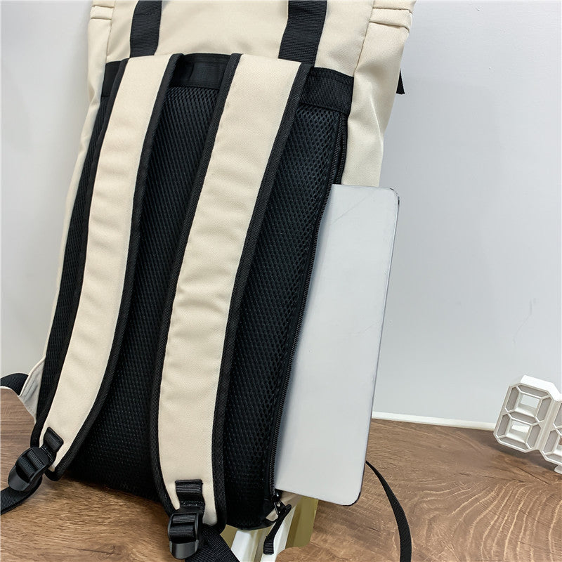 krémszínű uniszex laptop hátizsák hátoldali pántokkal és oldalsó laptoptartóval