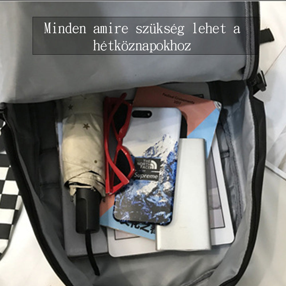 fekete iskolai laptop hátizsák nyitott belsővel, laptoprekesszel és mindennapi tárgyakkal