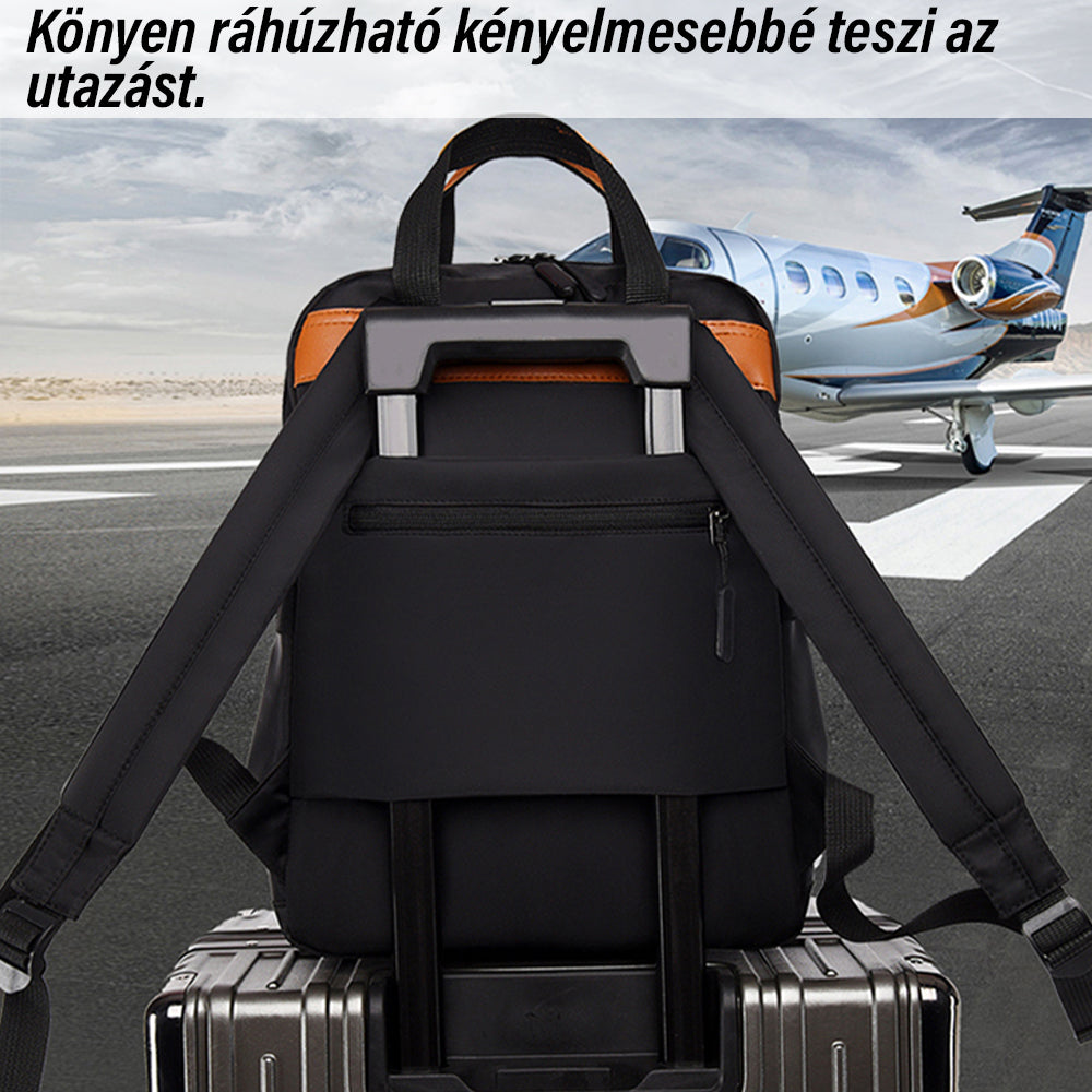 fekete kompakt laptop hátizsák bőröndre rögzítve repülőtéri utazós képen