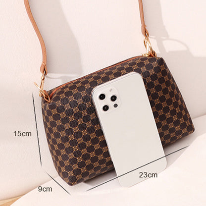 barna kockás mini női válltáska méretábrán 23 x 15 x 9 cm telefon mellett